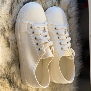 Size 8 white canvas platform sneakers.